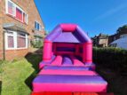 pink purple bouncy castle image 3 min