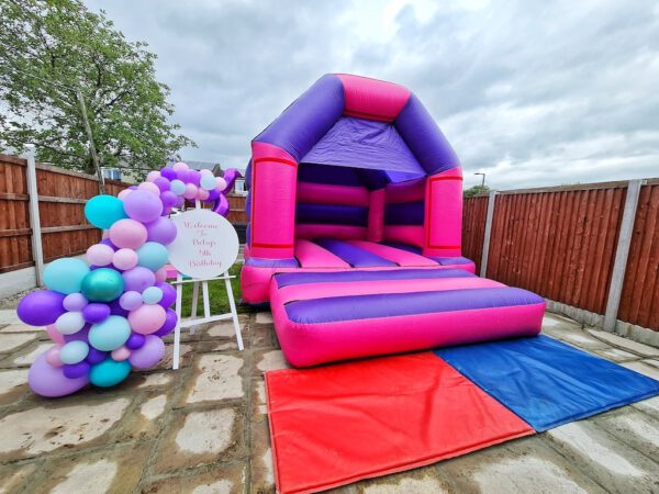 pink purple bouncy castle image 7 min