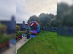 super heroes bouncy castle image 12 min