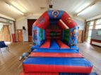 Hire super heroes bouncy castle in Wilmslow and Hale
