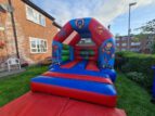 super heroes bouncy castle image 8 min