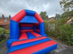 plain red and blue bouncy house